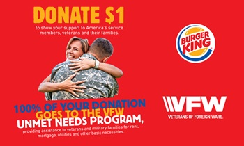 Soldier hugs his wife Burger King raises money for VFW