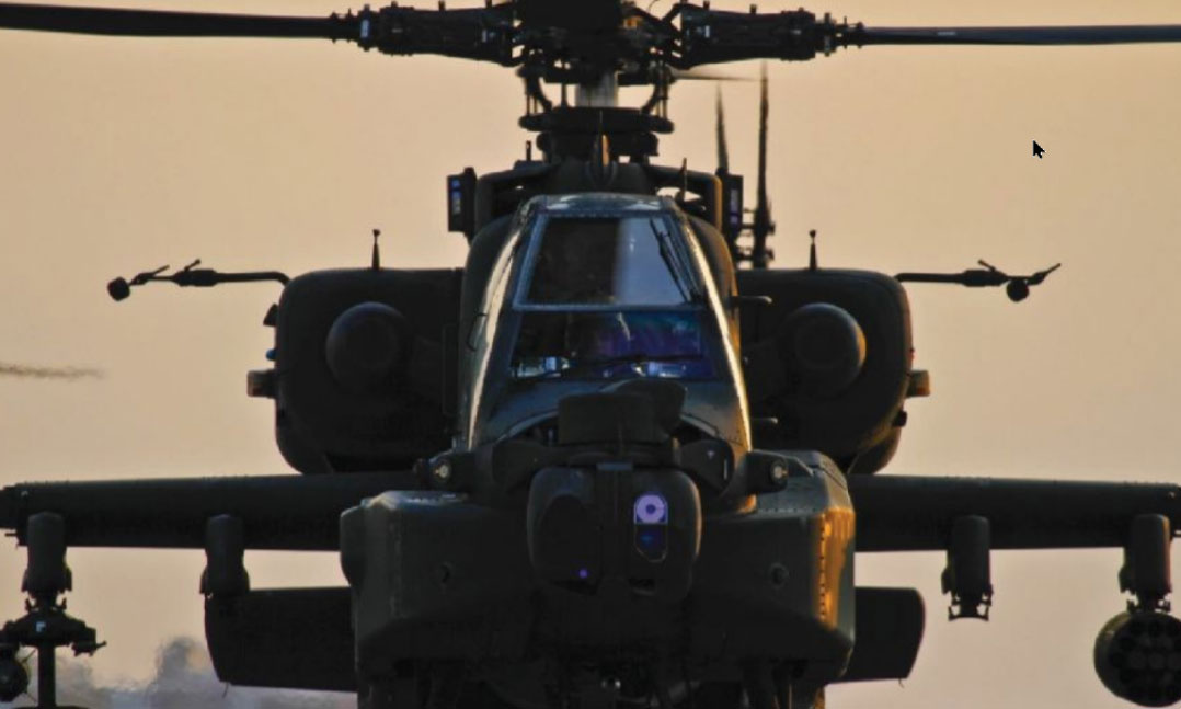 An Army AH-64 Apache attack helicopter prepares to depart Bagram Airfield in Afghanistan on Jan. 7, 2012