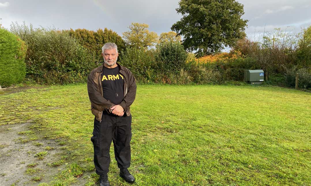 Veteran standing in a field in France