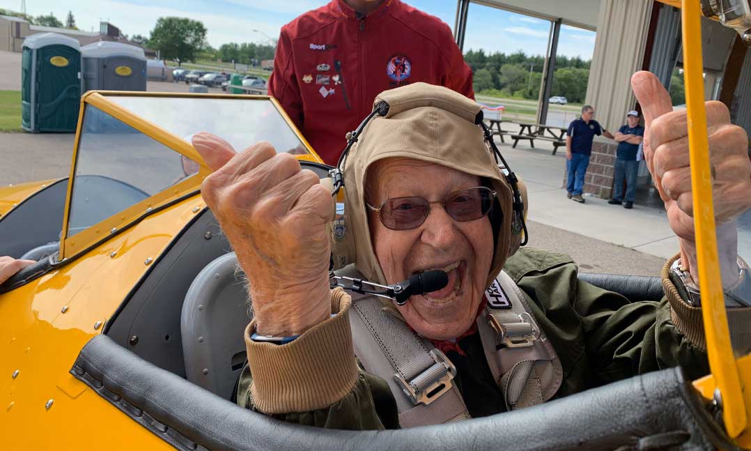 Smiling World War Two Veteran before a Stearman Airplane Ride
