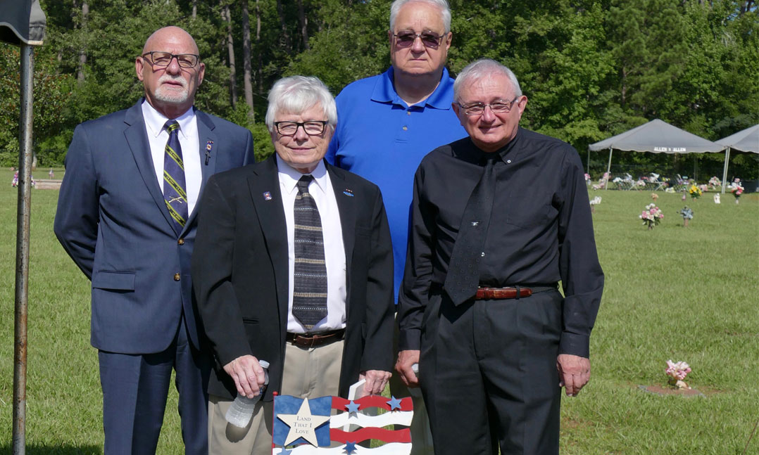 Harold Jantz, Roger Soiset, Robert Kenney and Richard Uhler last July at the grave of Vietnam veteran Lynwood Thornton in Thomasville, Ga.