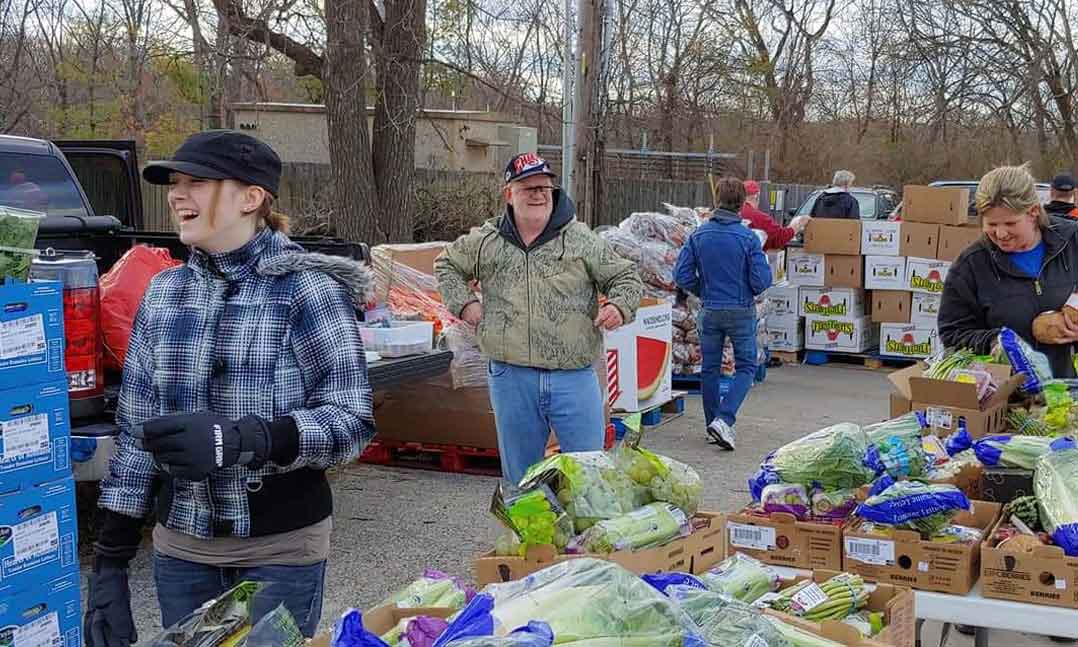 VFW and Auxiliary members gather donated food for veterans and their local communities