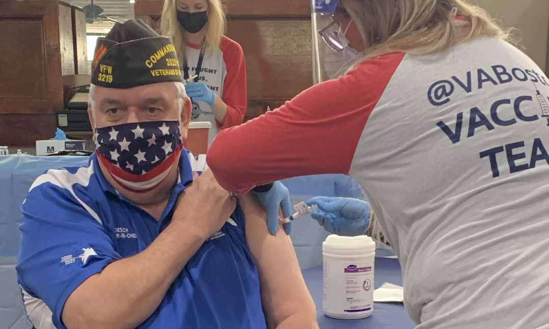 VFW National Commander Hal Roesch receives his first COVID-19 vaccine shot