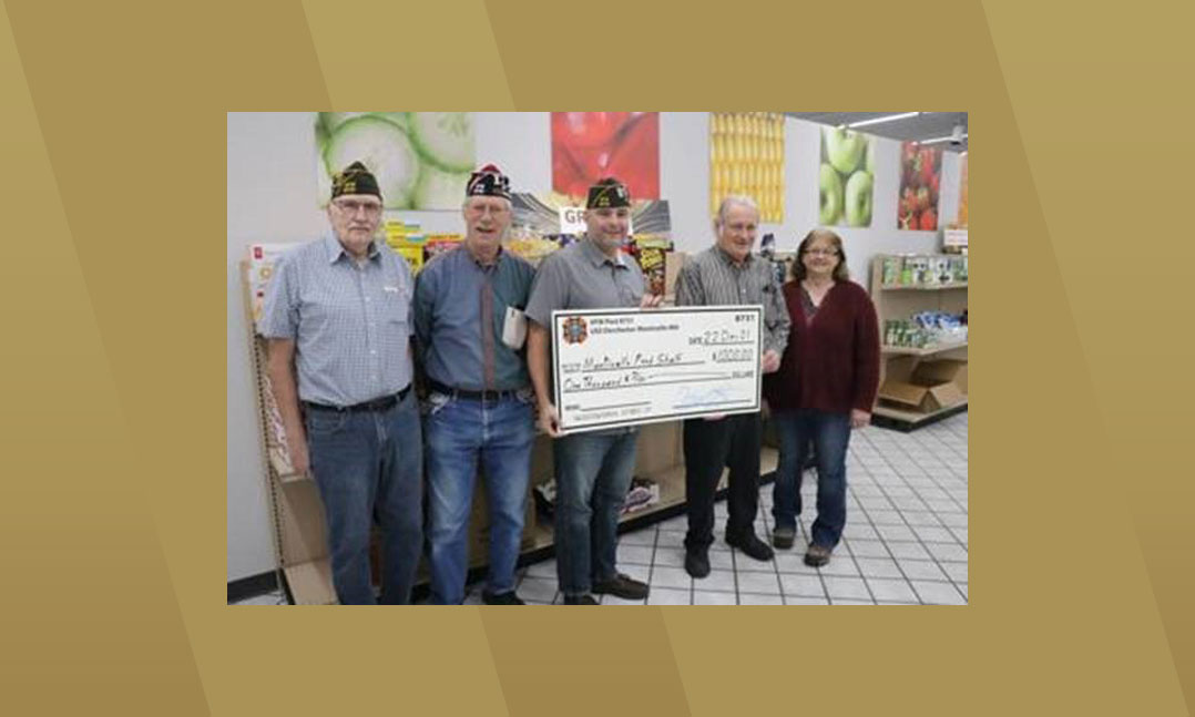 VFW Post 8731 members donated $1,000 to the local food bank in December
