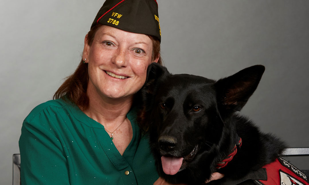 Army veteran Geraldine Rimpley and her service dog, Katy