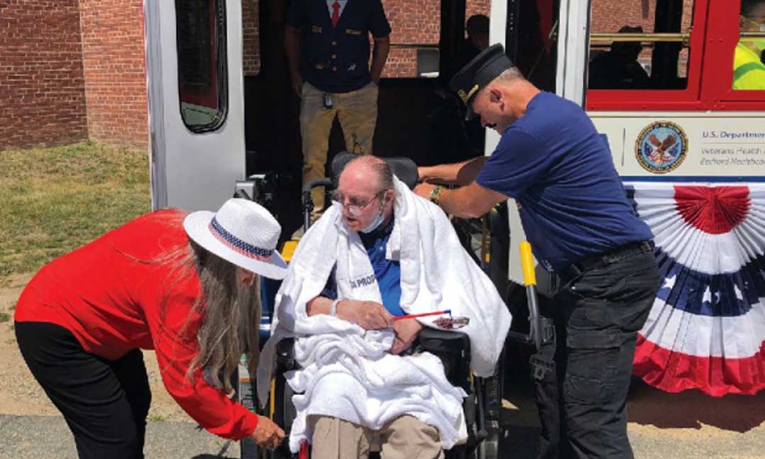 Jimmy Cousineau, a Vietnam War vet and VFW Post 1105 member, is among the many patients of the VA hospital in Bedford, Mass., to be lifted onto the trolley for its June 23 inaugural ride.
