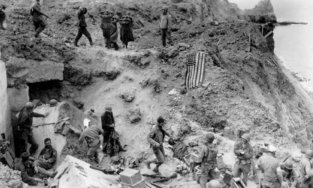 Troops relieve Army Rangers at Point du Hoc on June 8, 1944, after the Allied forces’ invasion of Normandy, France