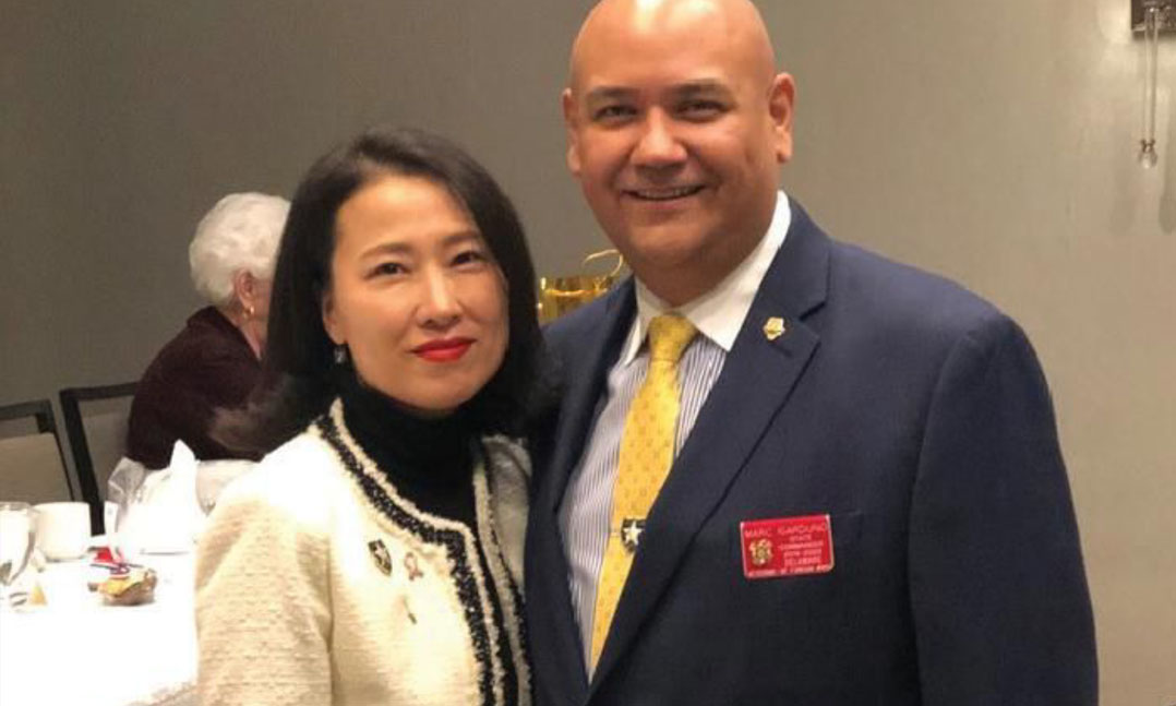 Hyun-Ju Garduno and her husband, Marc, attend a VFW event in 2021 in Delaware. Garduno is now a member of VFW Post 6483 Auxiliary in Milford, Del., after the VFW Auxiliary voted to change its bylaws to allow non-U.S. citizens to join the organization.