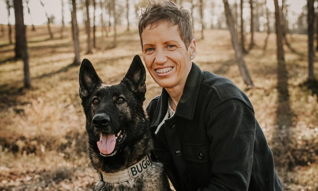 Army combat medic Natalie Vines and her service dog, Bugg
