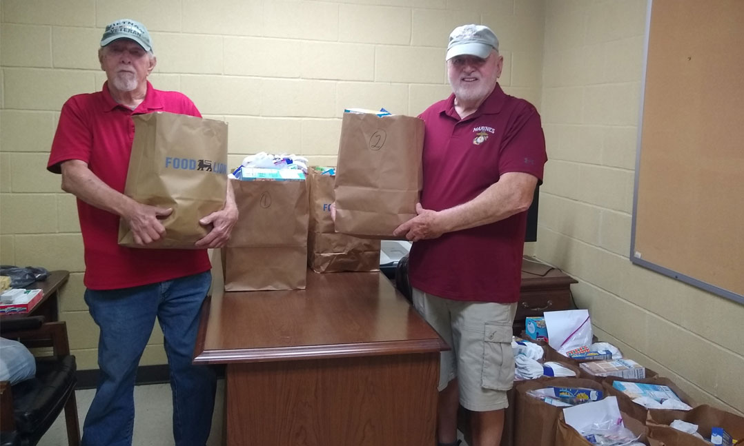 Veterans collect groceries for veterans in need