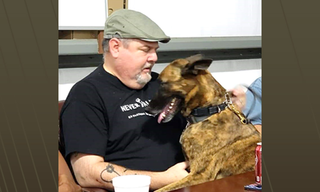 Army Reserve veteran Jeff Snyder and his service dog Echo