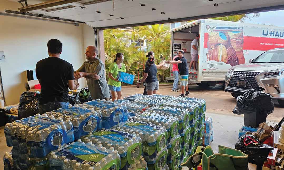 VFW Post 3850 members and additional community volunteers in Maui, Hawaii, load a truck with much-needed supplies in August