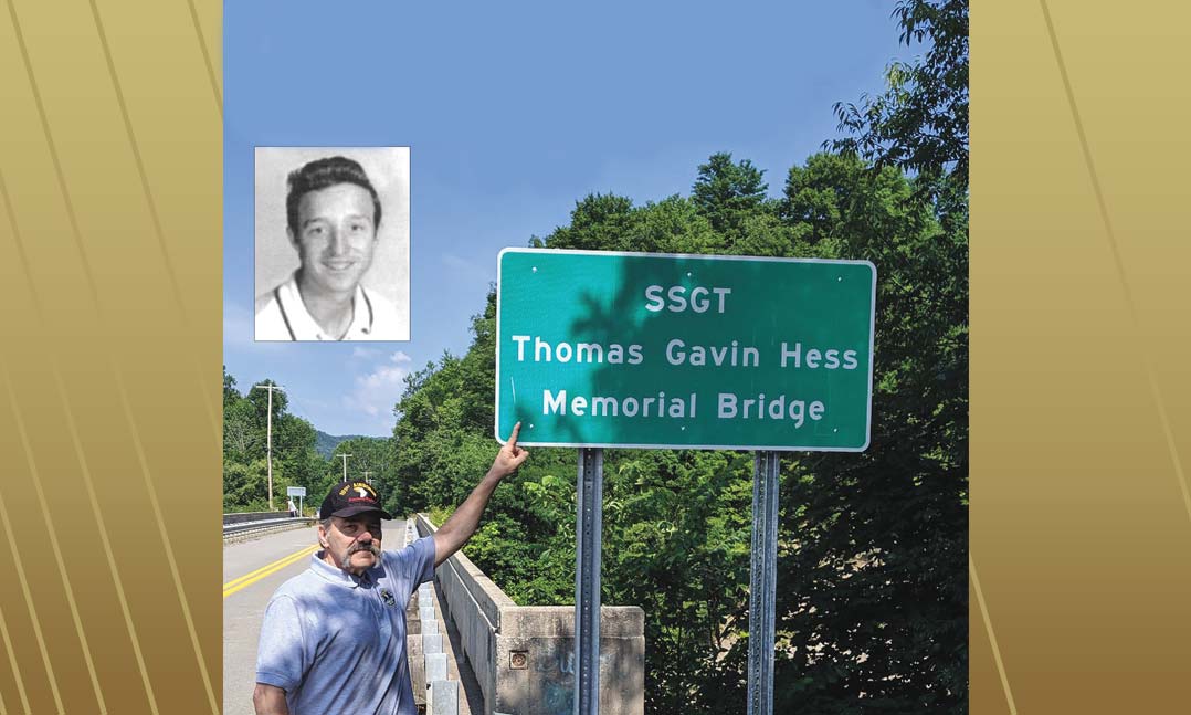 Peter Agriostathes, life member of VFW Post 2875 in Pahrump, Nev., stands in front of a bridge dedicated to his friend Thomas Hess