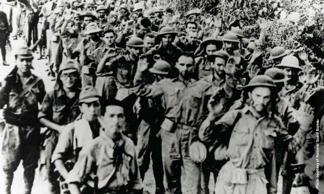 U.S. Army National Guard and Filipino soldiers shown at the outset of the Bataan Death March