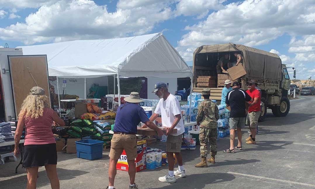 Volunteers collect food and necessities for disaster assistance