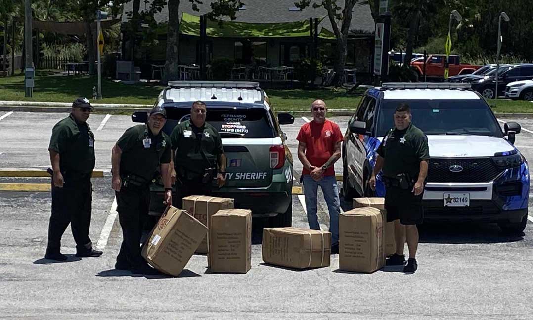 VFW Post members drop off back to school supplies and backpacks