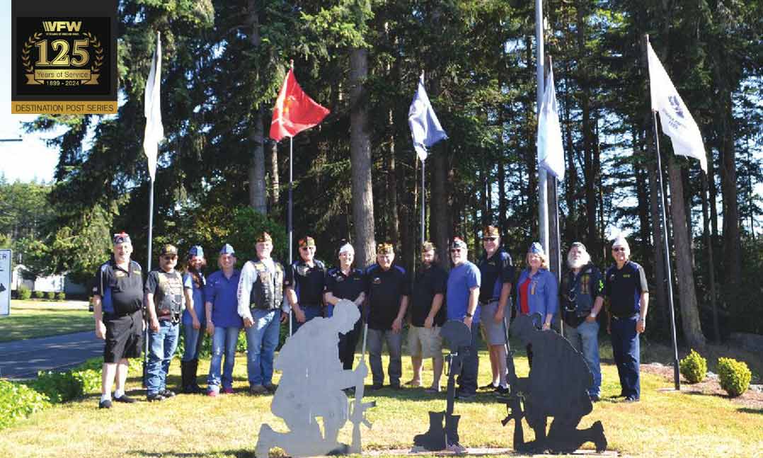 Members of VFW Post 7392 gather by their Post memorial in front of the campgrounds at the Post in Oak Harbor, Wash., on July 1.