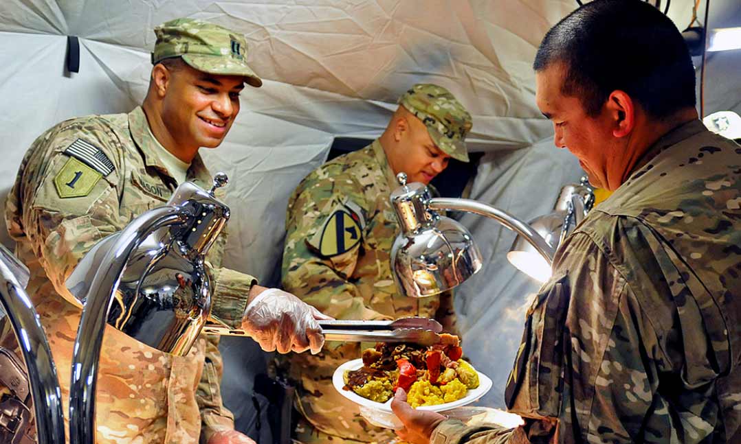 Deployed troops enjoying Thanksgiving dinner