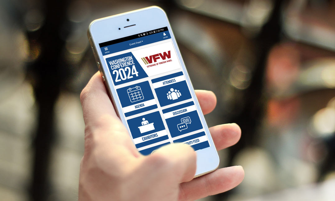 Hand holding phone featuring VFW Event App
