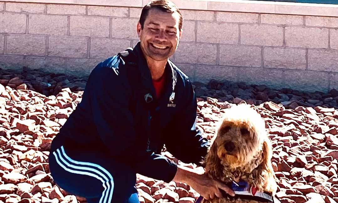 Veteran Alan Deogracias and his companion therapy dog, Sansa