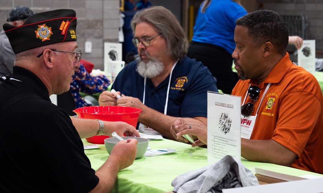 VFW members participate in a seed sorting event